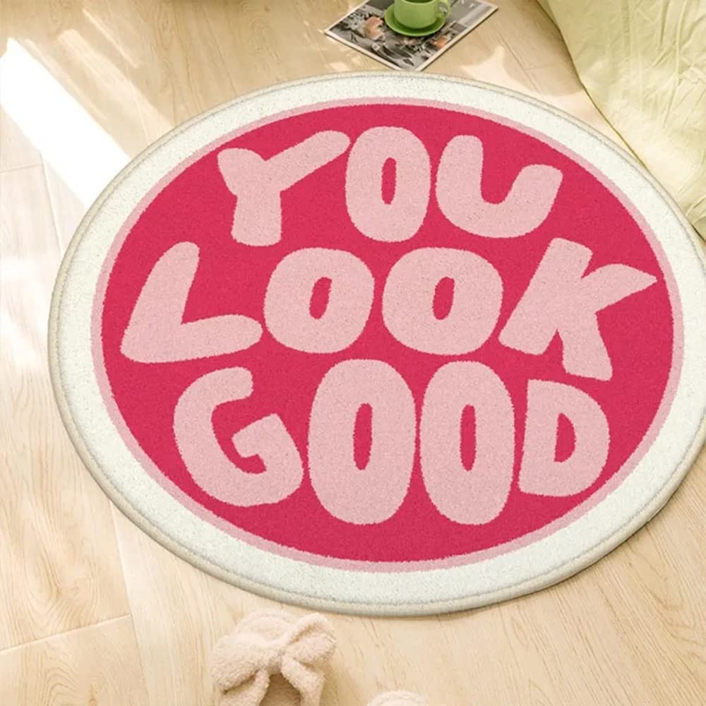 Tapis de bain rond rose antidérapant pour sécuriser la douche et éviter les glissades