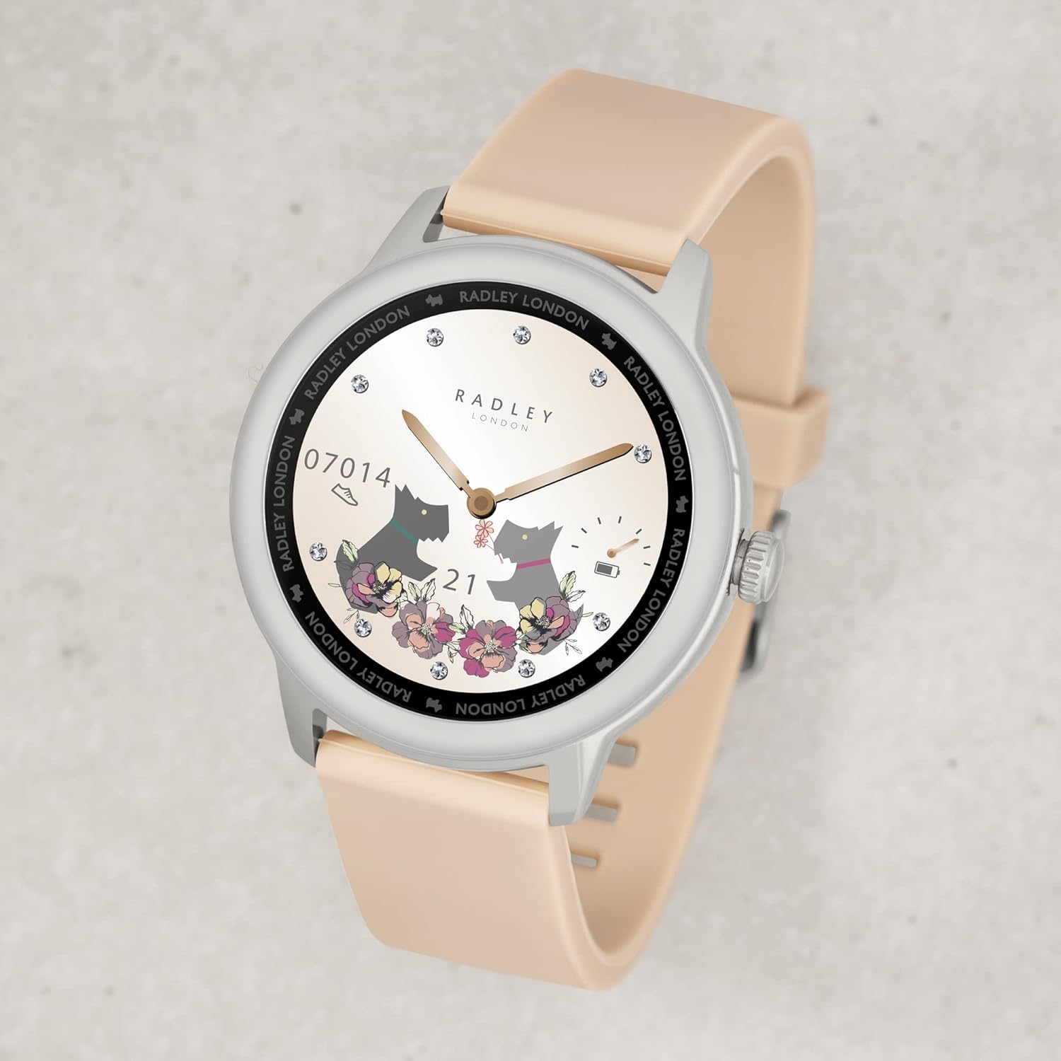 Radley Series 7 Smartwatch with a pink silicone strap and a floral watch face.