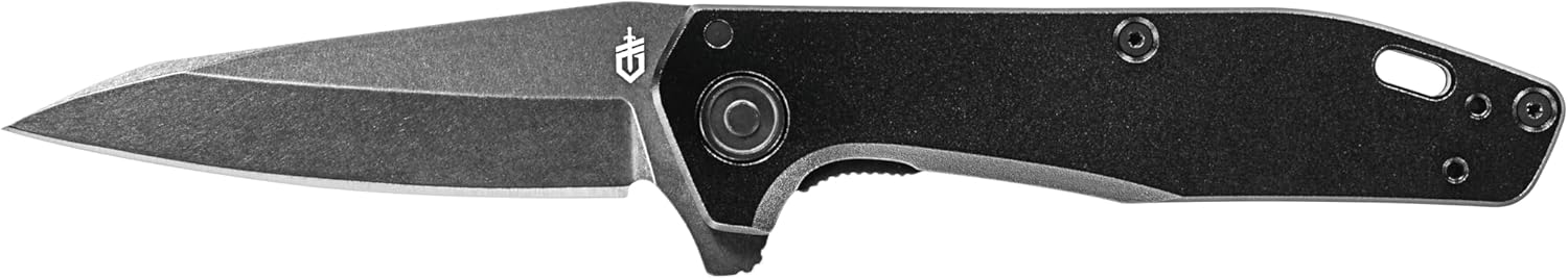 Gerber Fastball style pocket knife on outdoor wood surface