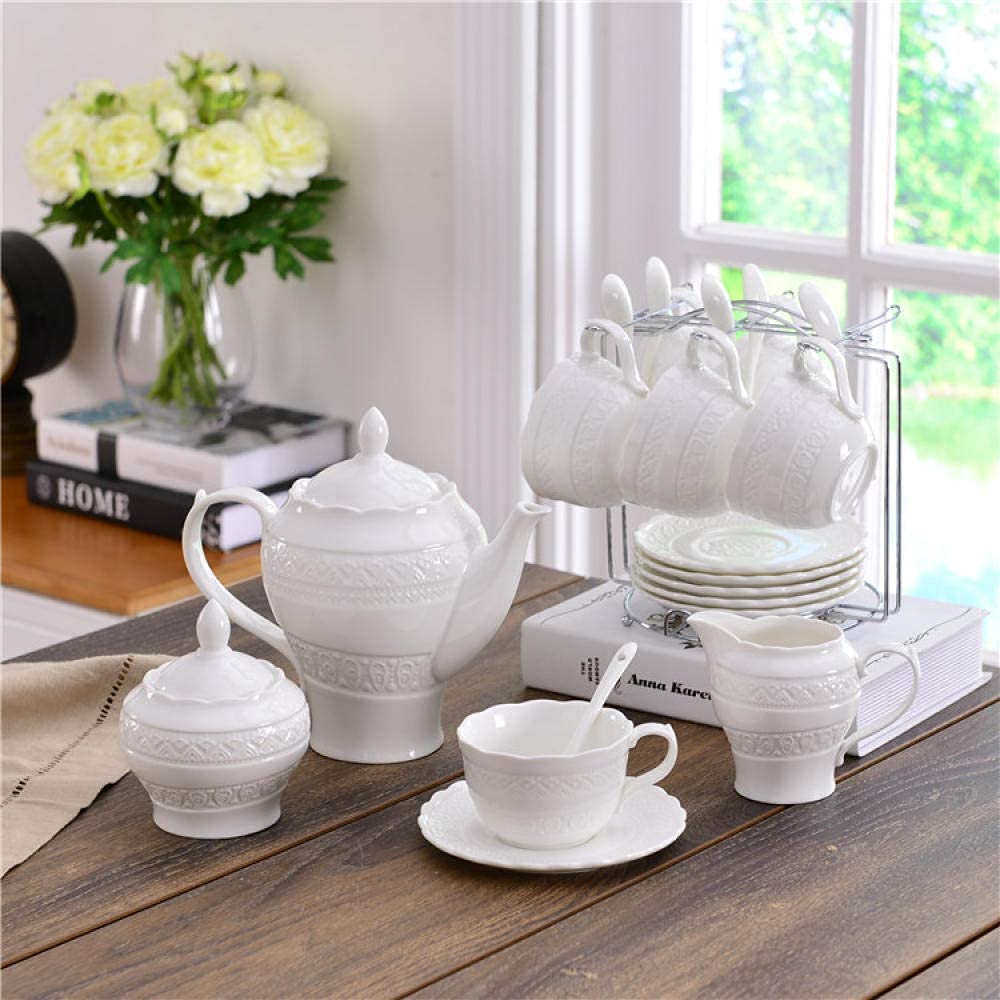 Service à thé porcelaine blanche avec tasse à café et soucoupe en relief