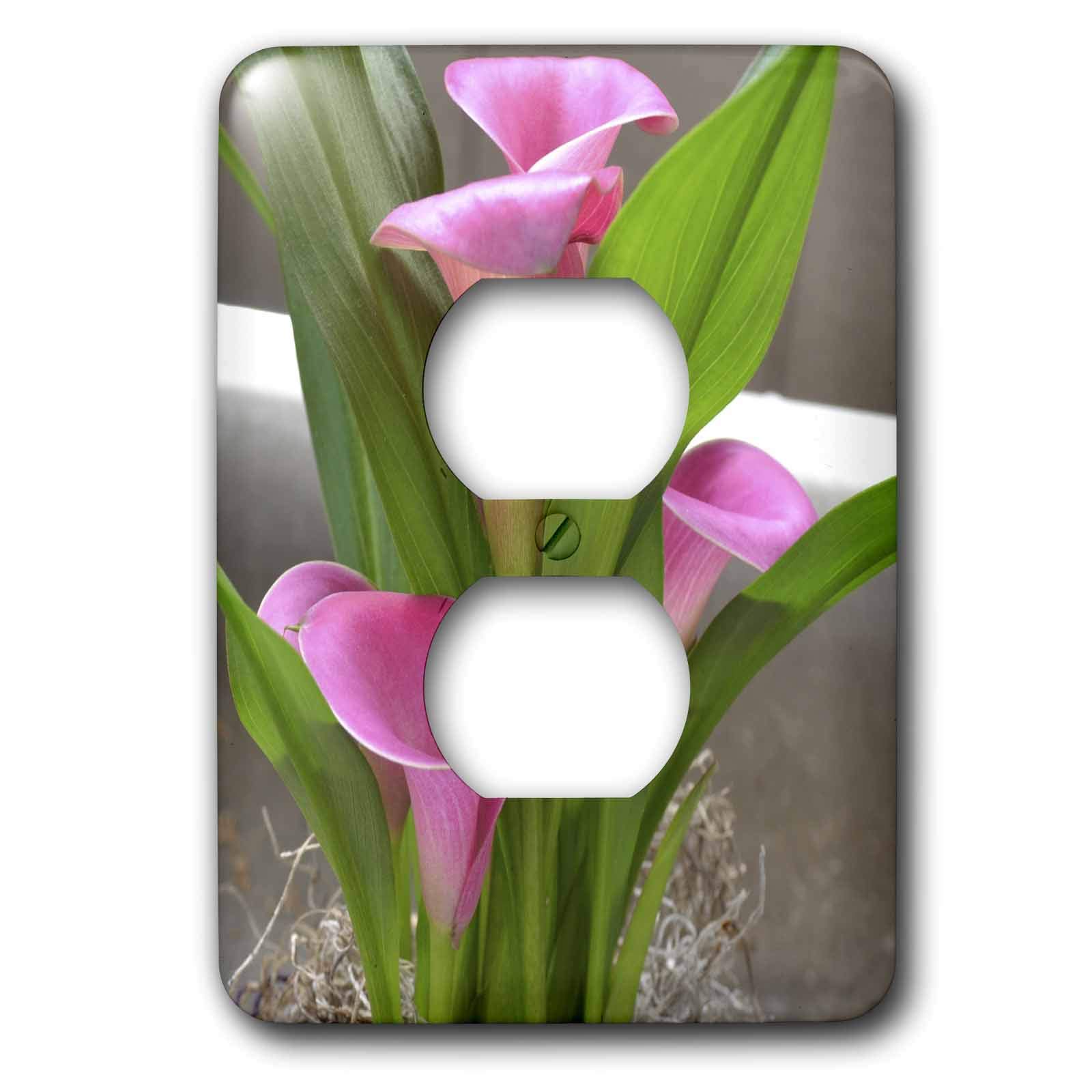 Plaque fleur de lys et calla rose pour cacher les fixations de 2 prises murales