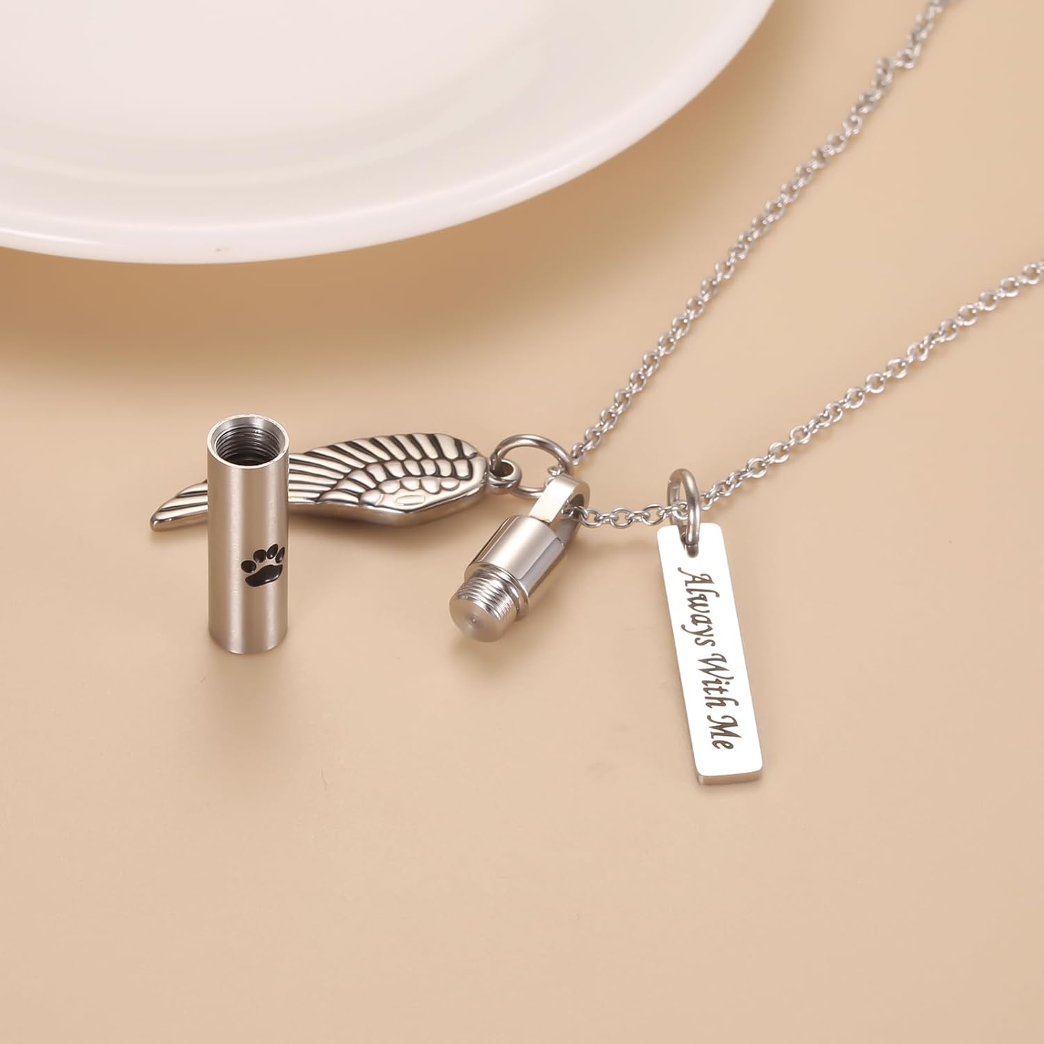 遺灰用ジュエリー 犬の足跡プリント 円柱骨壺ネックレス Keespsake Hold Angel Wing ステンレススチール ペッ