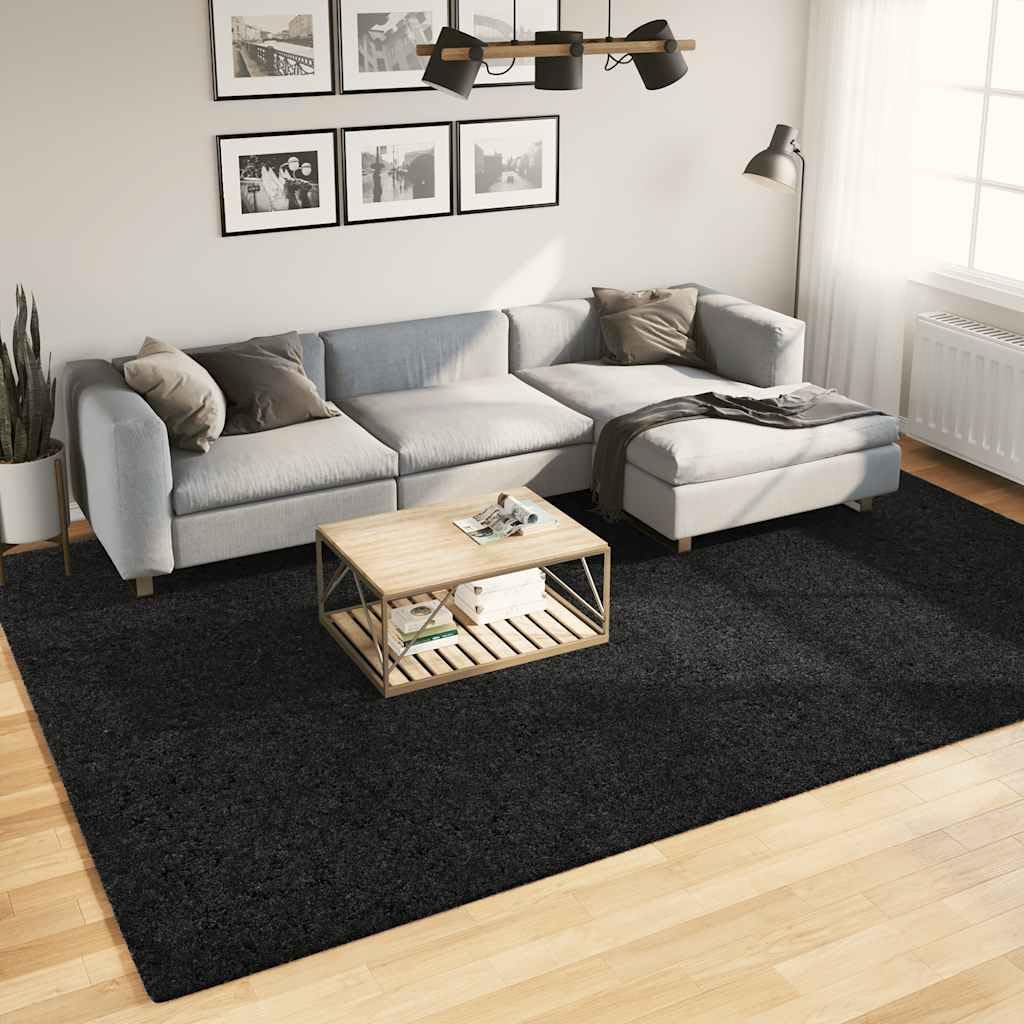 Tapis salon noir Oviedo 240 x 340 cm pour éliminer le froid au sol avec style doux