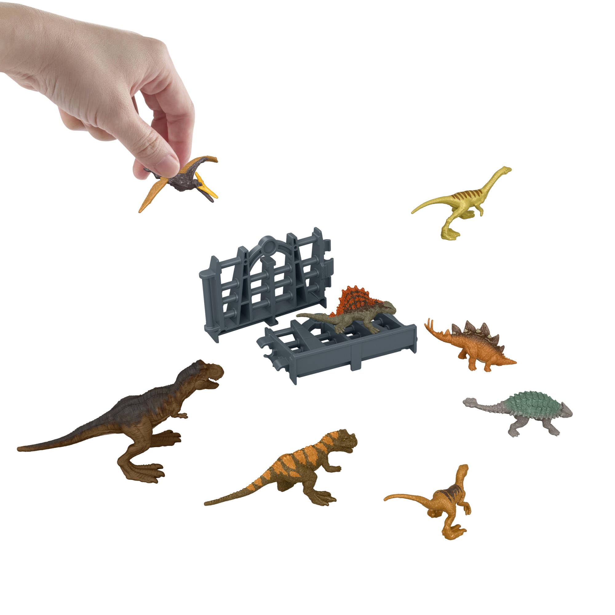 Mattel Jurassic World Calendario de Adviento, 24 días, 19 minis | Tema visita a la isla de Jurassic Park; sorpresas: dinosaurios, figura humana y accesorios, JLD23