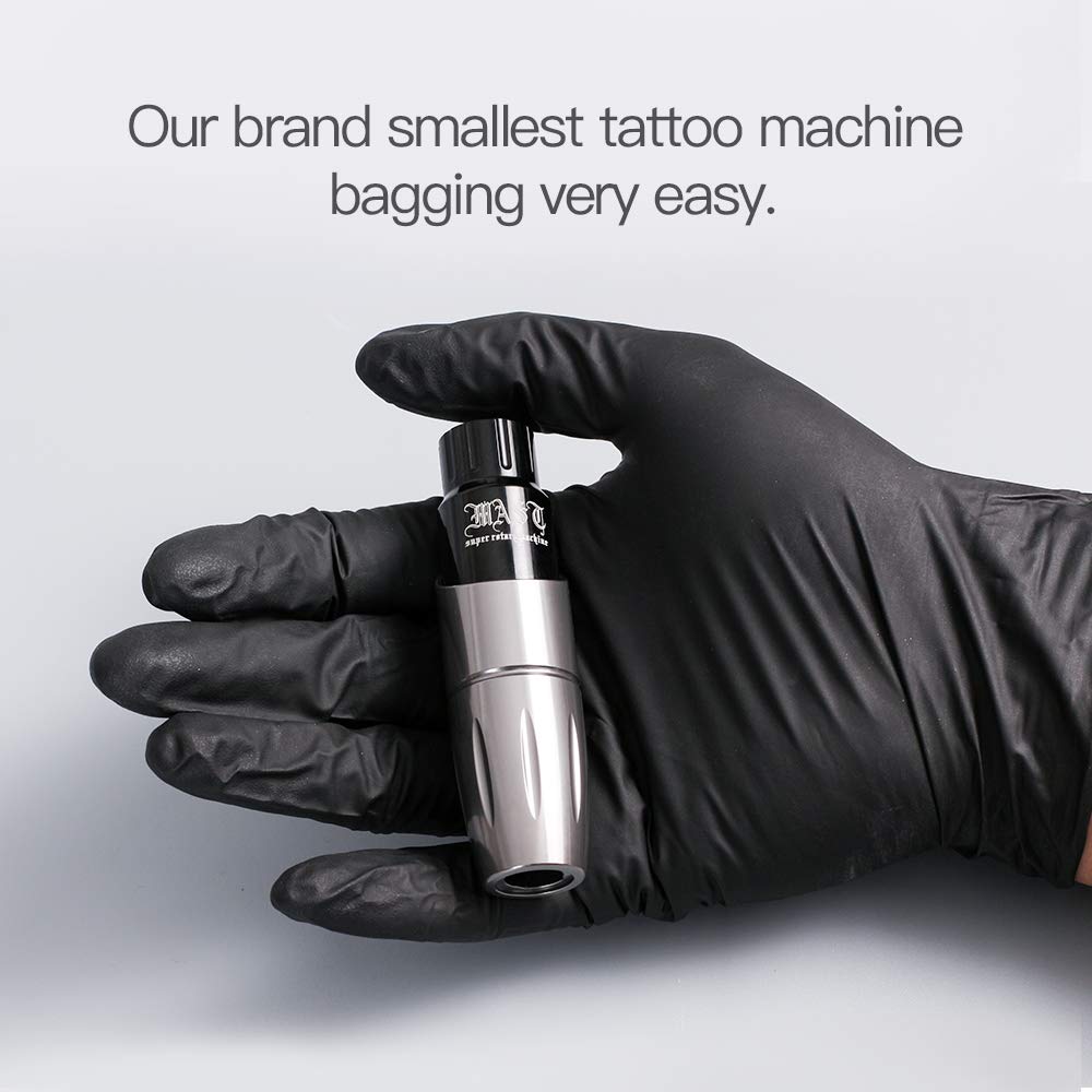 Hand holding the compact Mast Tour tattoo machine