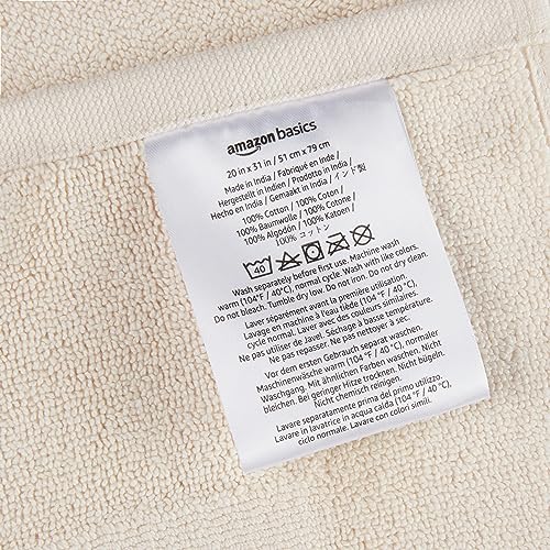 Image of Amazon Basics Banded Bathroom Bath Rug Mat, Machine Washable, Super Absorbent, 100% Cotton, 20 inch W x 31 inch L, Cream (Pack of 2)