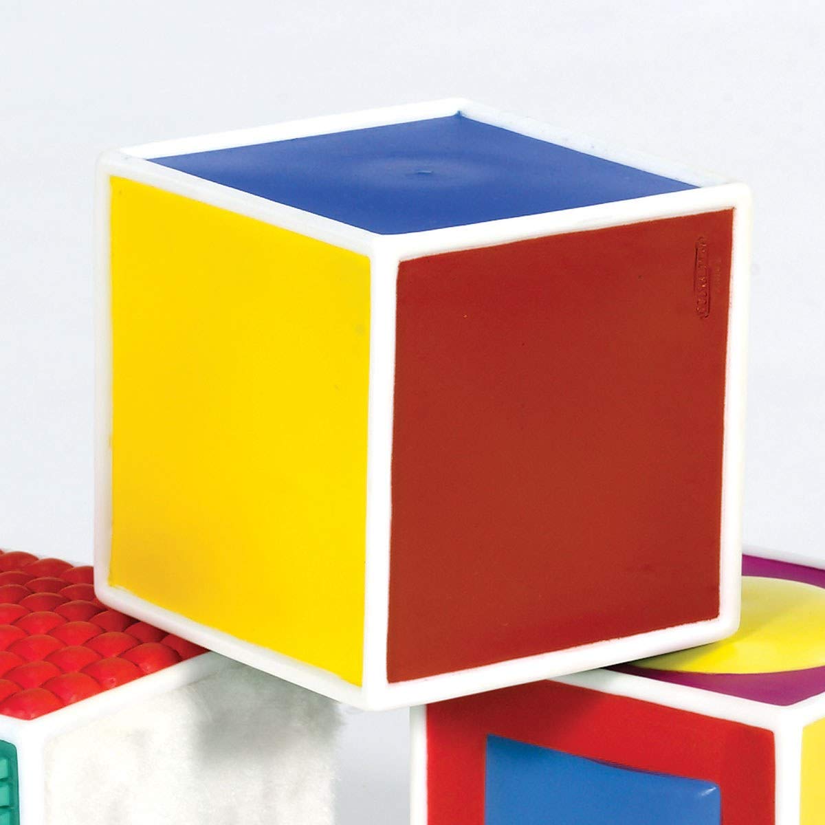 Kaplan Early Learning Soft Tactile Blocks - Set of Three 4" Blocks with Different Textures, Shapes, and Colors for Hand-Eye Coordination and Tactile Skills
