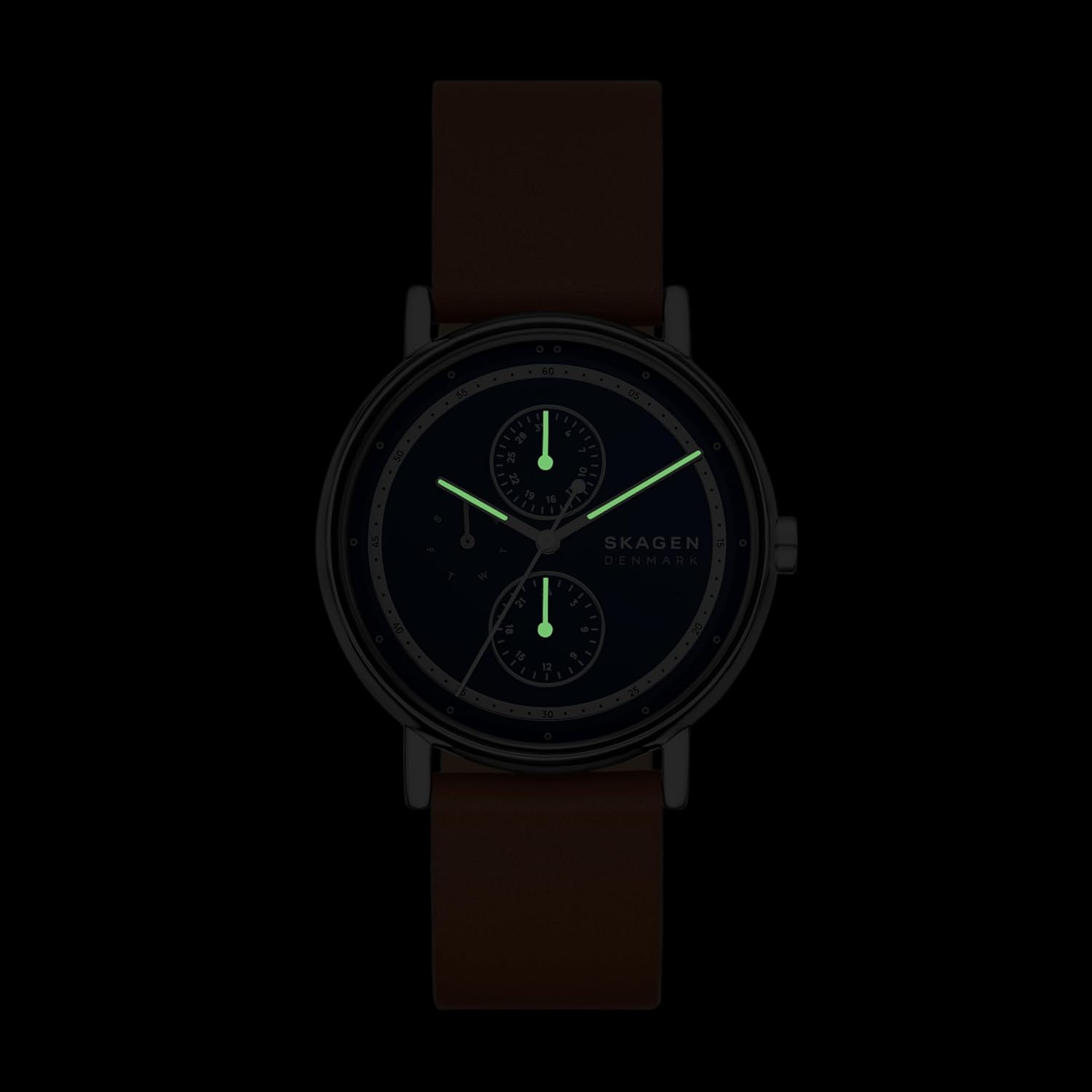 Skagen watch dial with luminous hands in the dark