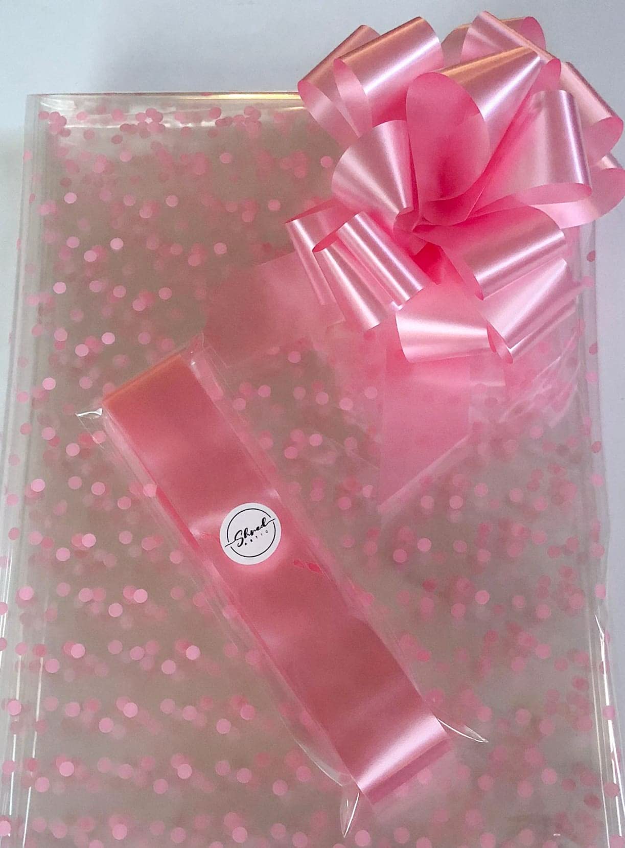 ShredAstic® Pink Dot Florist Cellophane wrap with 30mm Pull Bow (5 metres, pale pink)