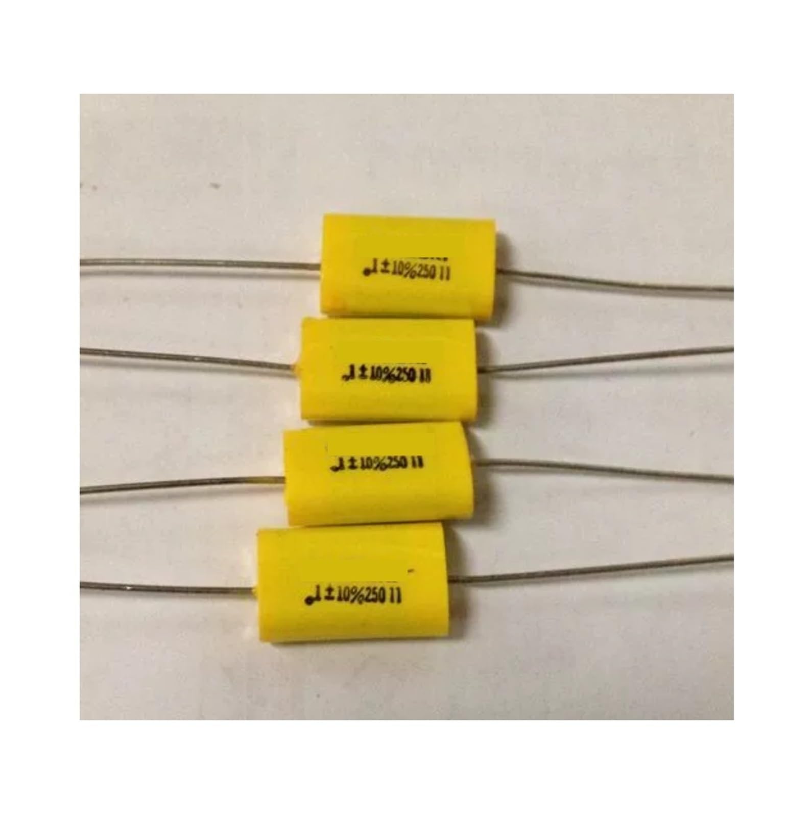 Condensateur de filtrage 0.1uF 250V axial pour réparation électronique