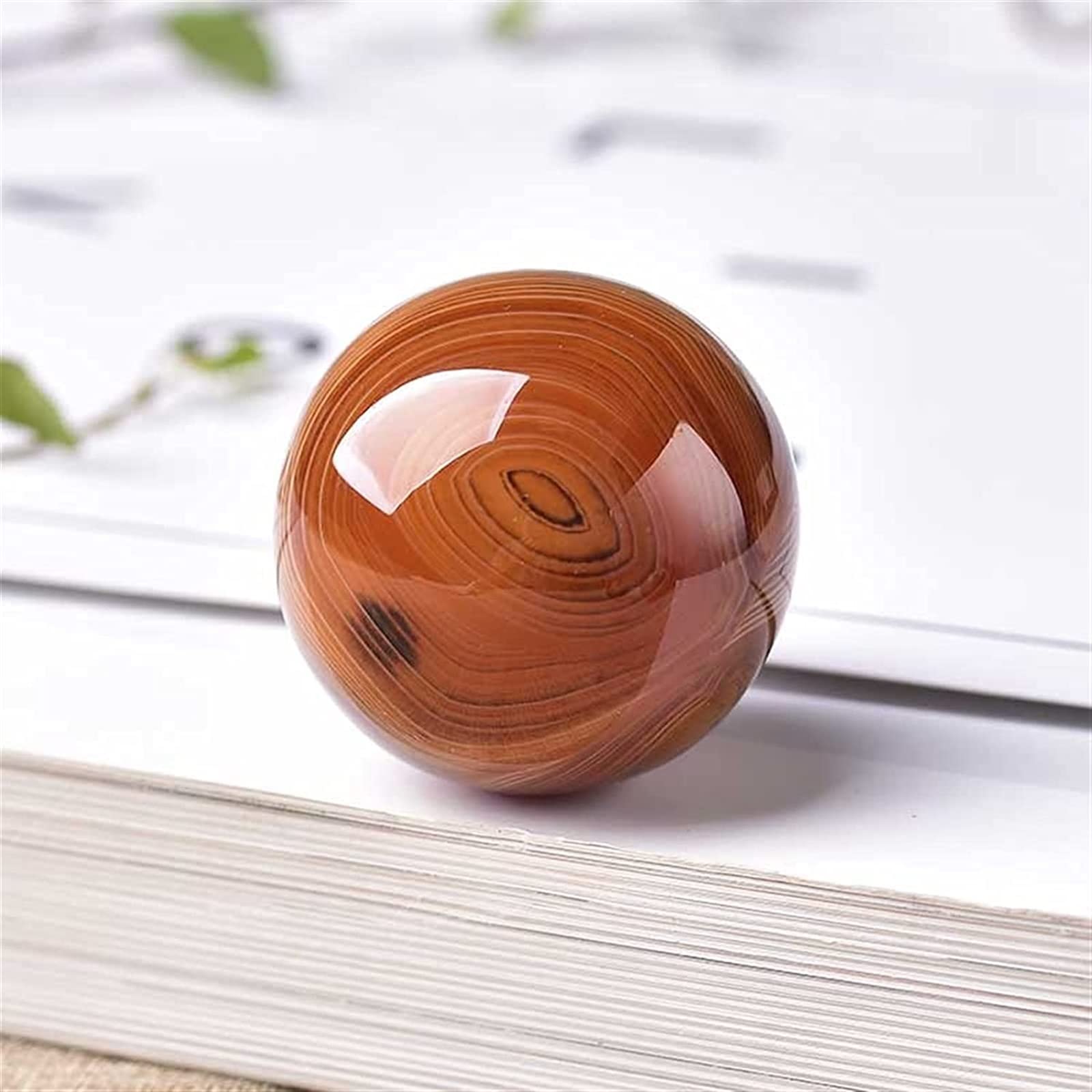 Agate rouge naturelle en sphère pour harmoniser votre salon et bureau