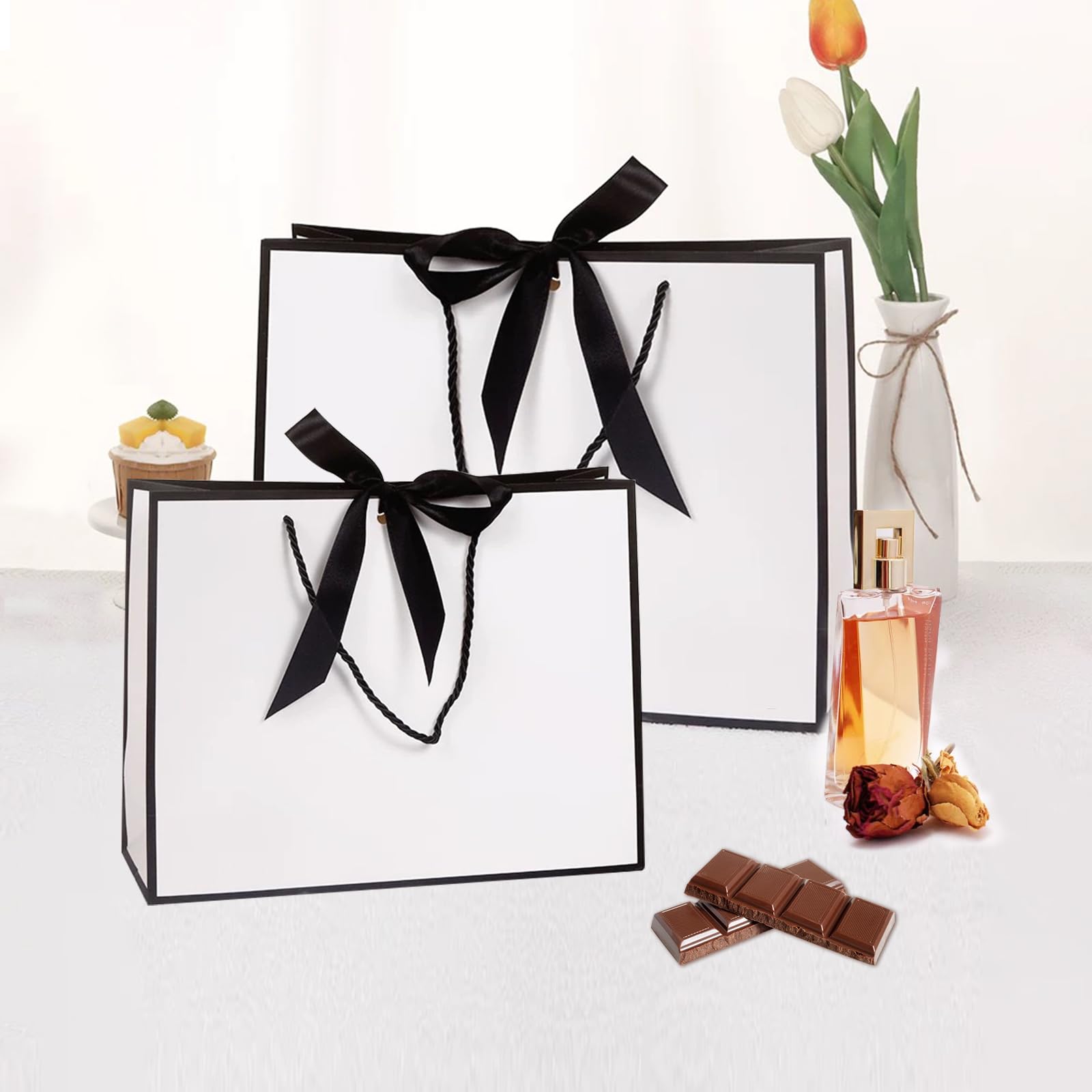 2 stuks papieren geschenkzakjes met handgrepen, 2