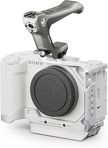 Tilta Jaula de media cámara para Sony ZV-E1  Zapata fría, riel OTAN, M3 y 14"-20 hilos  Mejora la funcionalidad  Incluye mango superior NATO (plata, disponible en Yaxa El Salvador