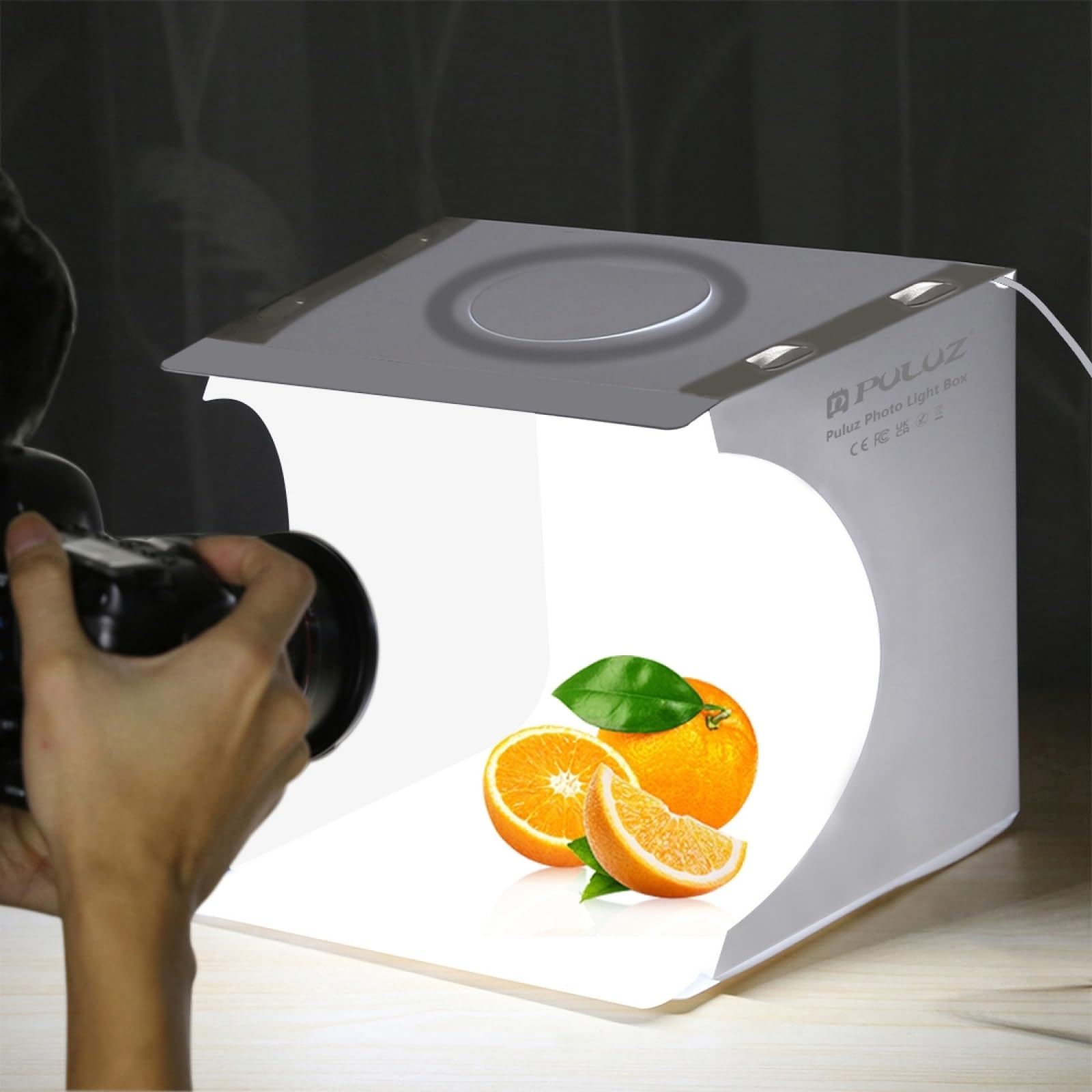 PULUZ Mini budka fotograficzna, przenośna składana skrzynka oświetleniowa do studia fotograficznego z regulowanymi 3 kolorami świateł i 6 kolorowymi tłami do fotografii biżuterii i małych przedmiotów