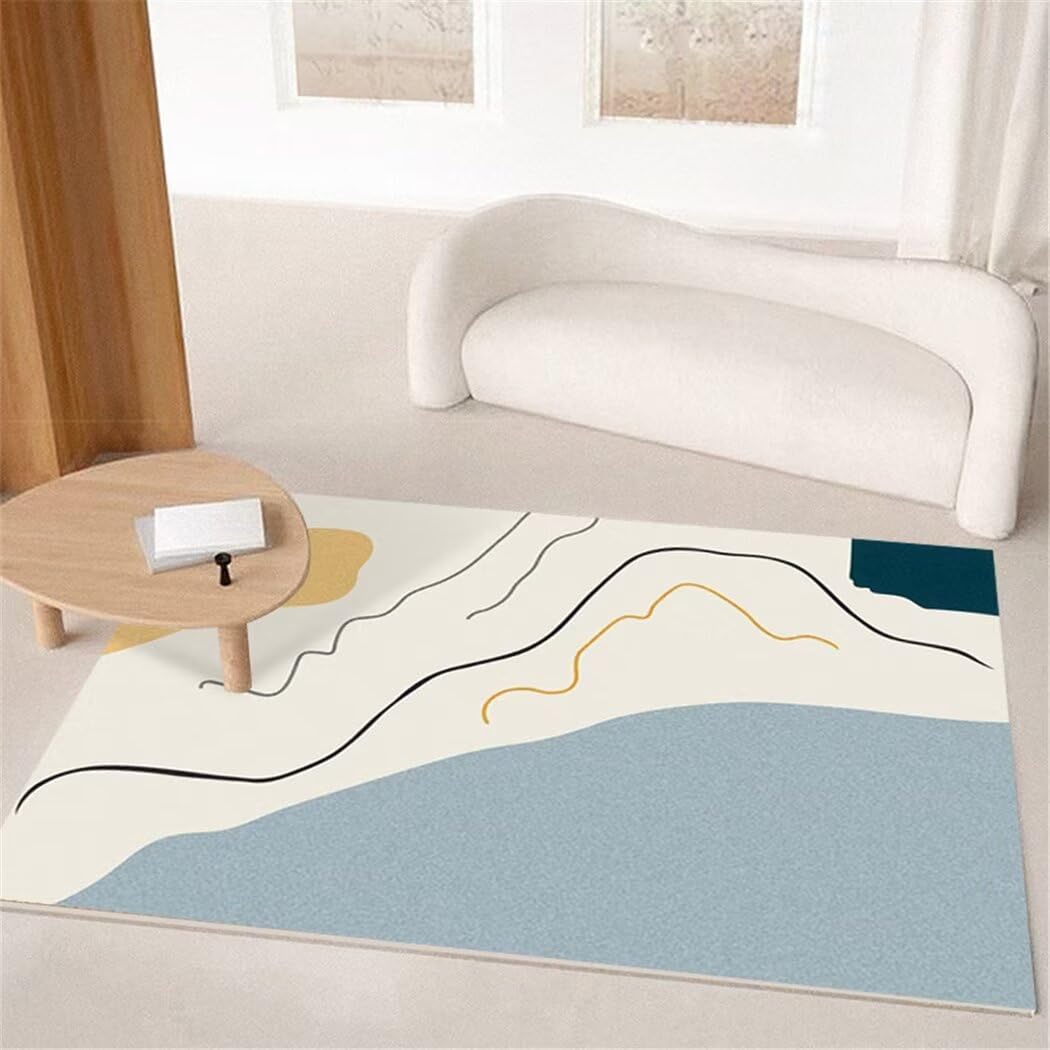 Tapis chambre bébé fille crème 100x160cm au design géométrique moderne