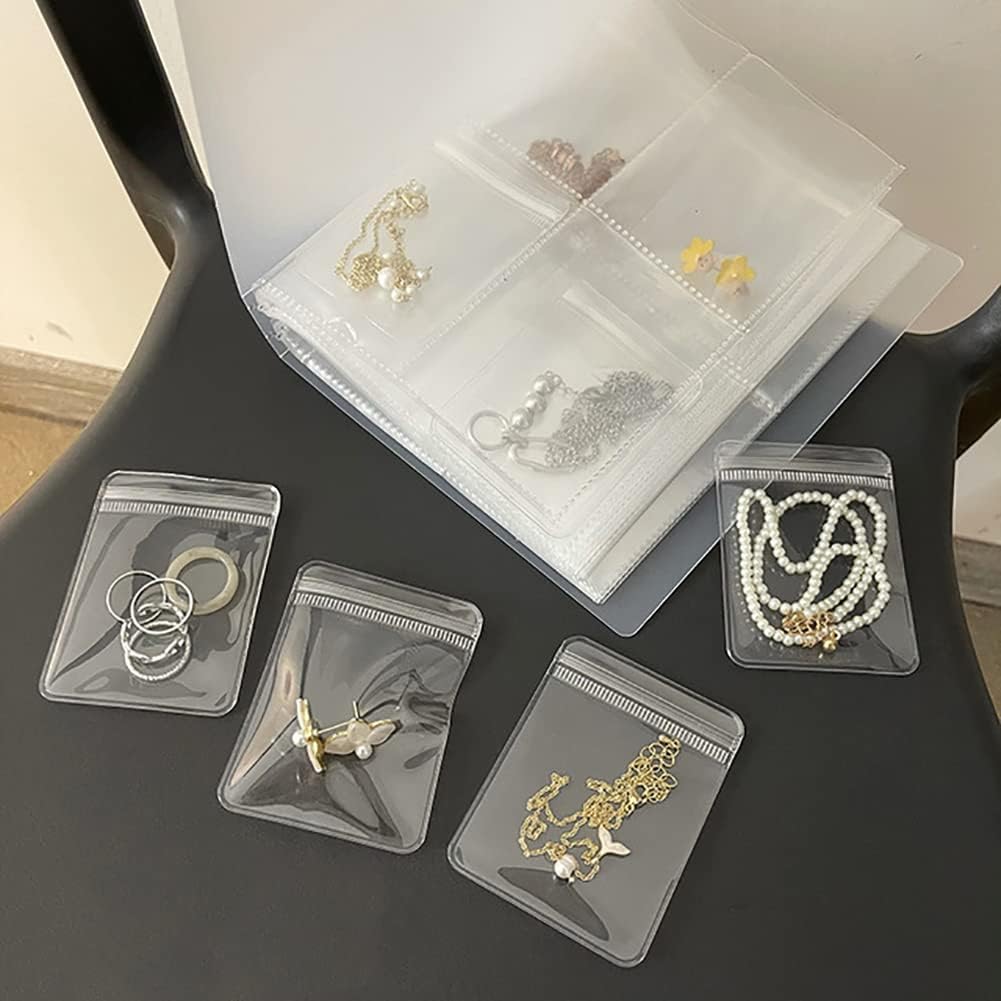 Livre De Rangement Bijoux Transparent - 84 Emplacements Avec 50 Poches Zippées | Protection Anti-Oxydation | Pour Boucles, Bagues, Colliers