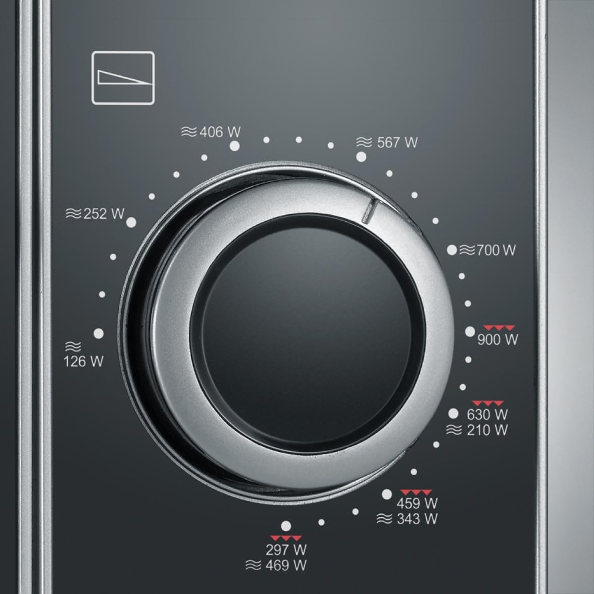 Close-up of the Severin MW7771 microwave oven's power selection knob, showing various wattage settings for microwave and grill functions.