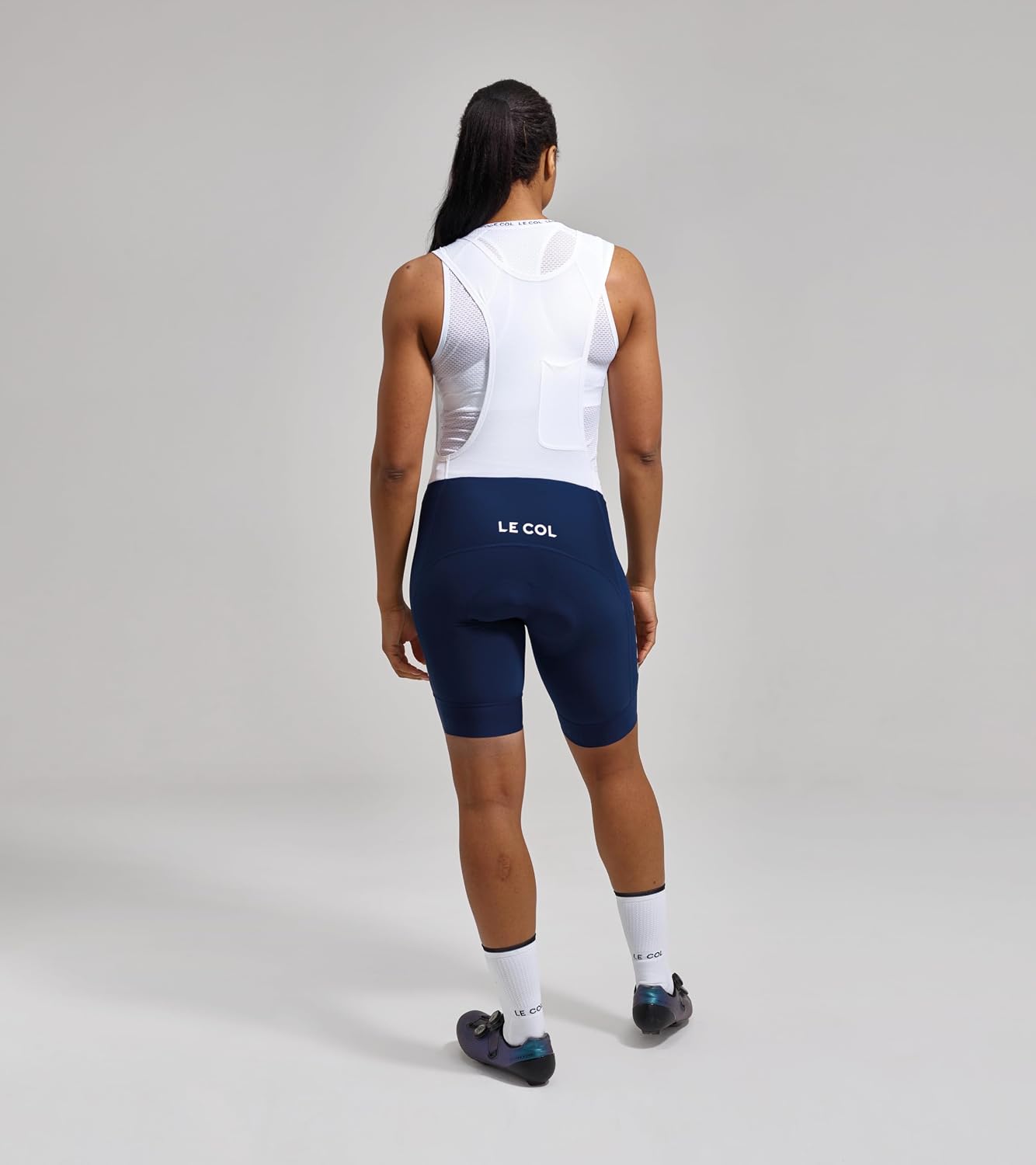 LE COL Women’s Pro Bib Shorts II | Padded Chamois Cycling Shorts | Lightweight Breathable Bike Pants (US, Alpha, Large, Regular, Navy/White)