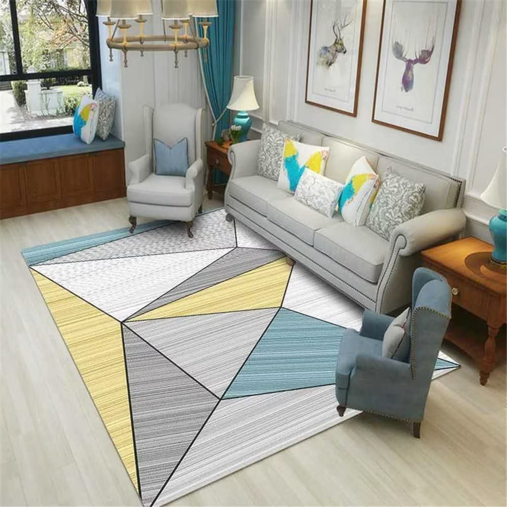 Tapis de chambre moderne bleu à triangles pour créer un coin d'étude
