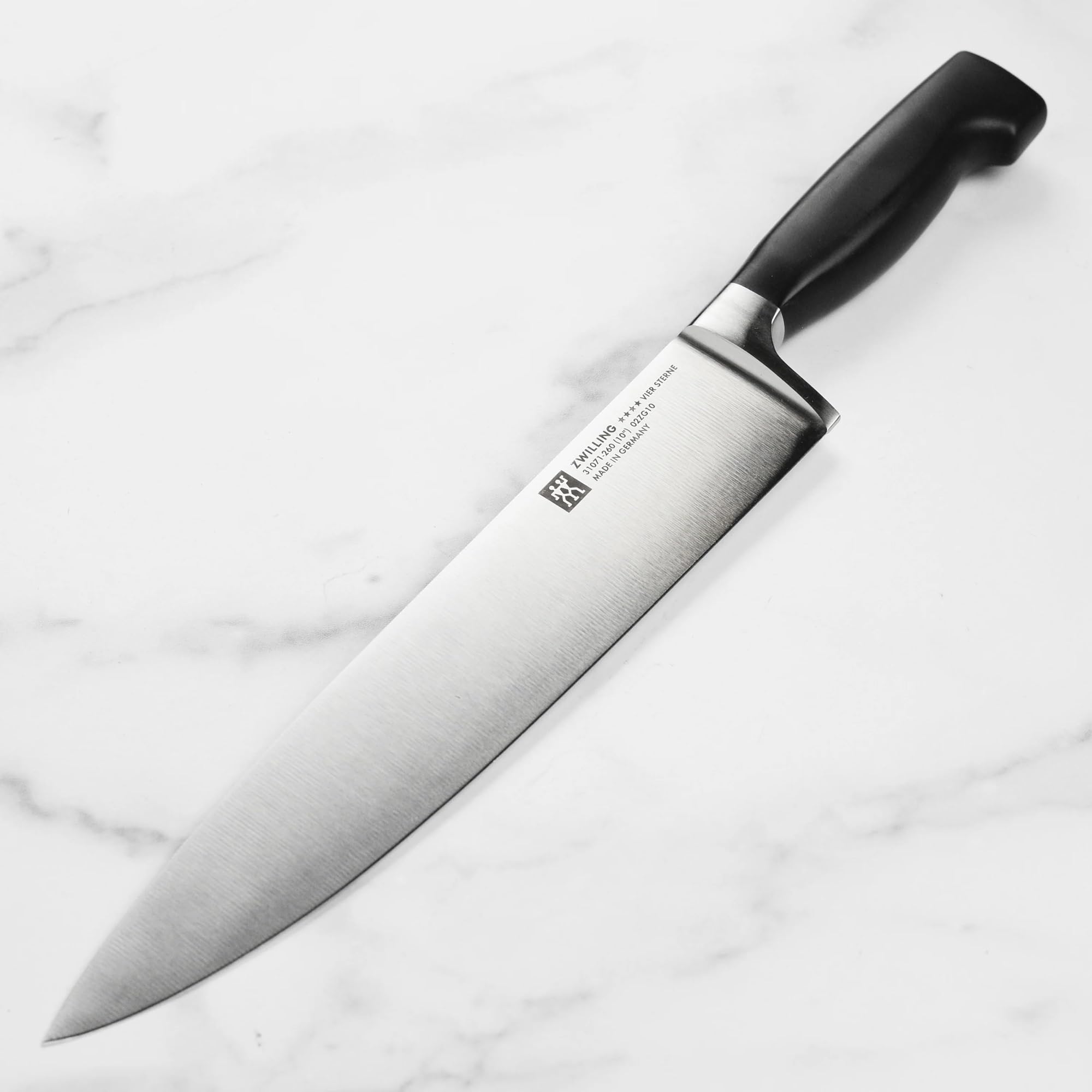 ZWILLING Four Star 10-inch Razor-Sharp German Chef's Knife, Made in Company-Owned German Factory with Special Formula Steel perfected for almost 300 Years, Dishwasher Safe — Amazon image 4