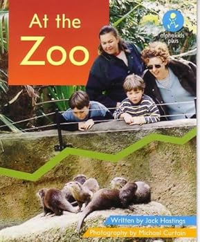 Paperback At the Zoo: Alphakids Plus (Emergant Reading Level 1) Book