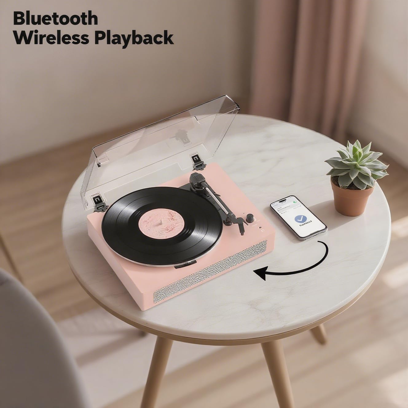 TANLANIN TE-2019A record player with a smartphone displaying Bluetooth connection