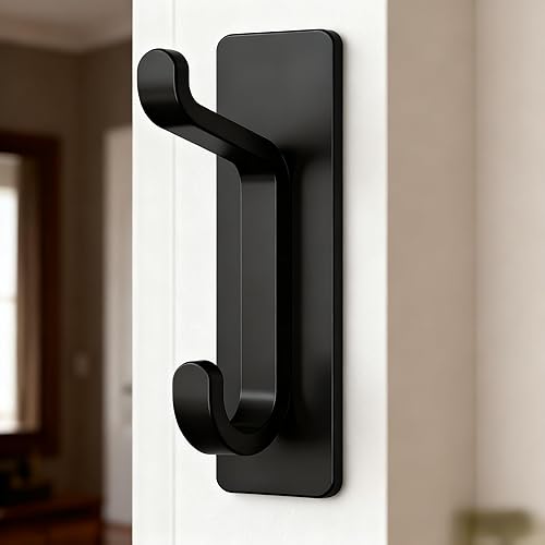 Paquete de 2 ganchos adhesivos de pared, color negro, 13 libras, gancho doble resistente para abrigo, toalla, sombrero, colgador de puerta