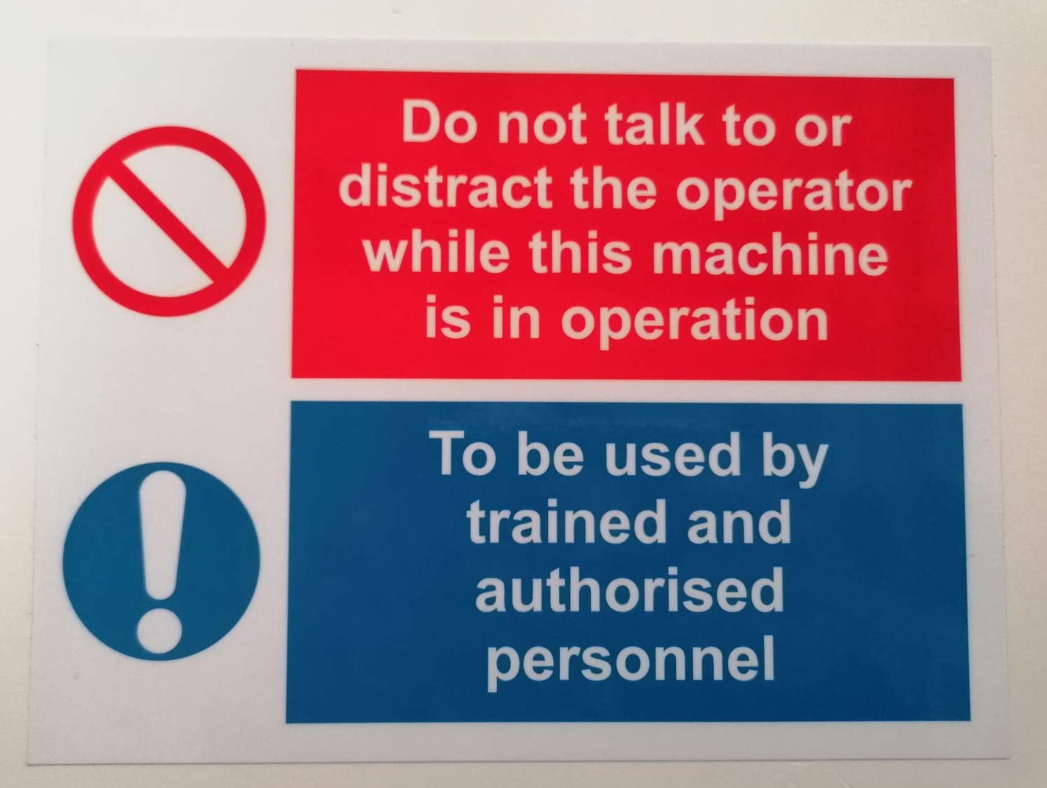 Do not talk to or distract the operator while this machine is in operation to be used by trained and authorised personnel safety sign - 1.2mm Rigid plastic 300mm x 200mm