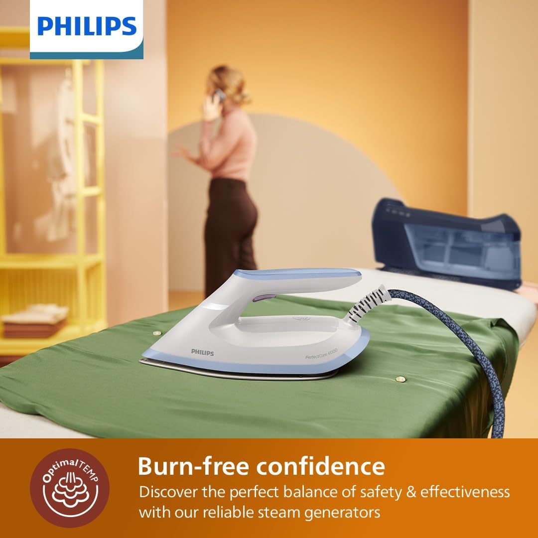 Philips PerfectCare 6000 Series Steam Generator Iron resting safely on a green fabric without burning.