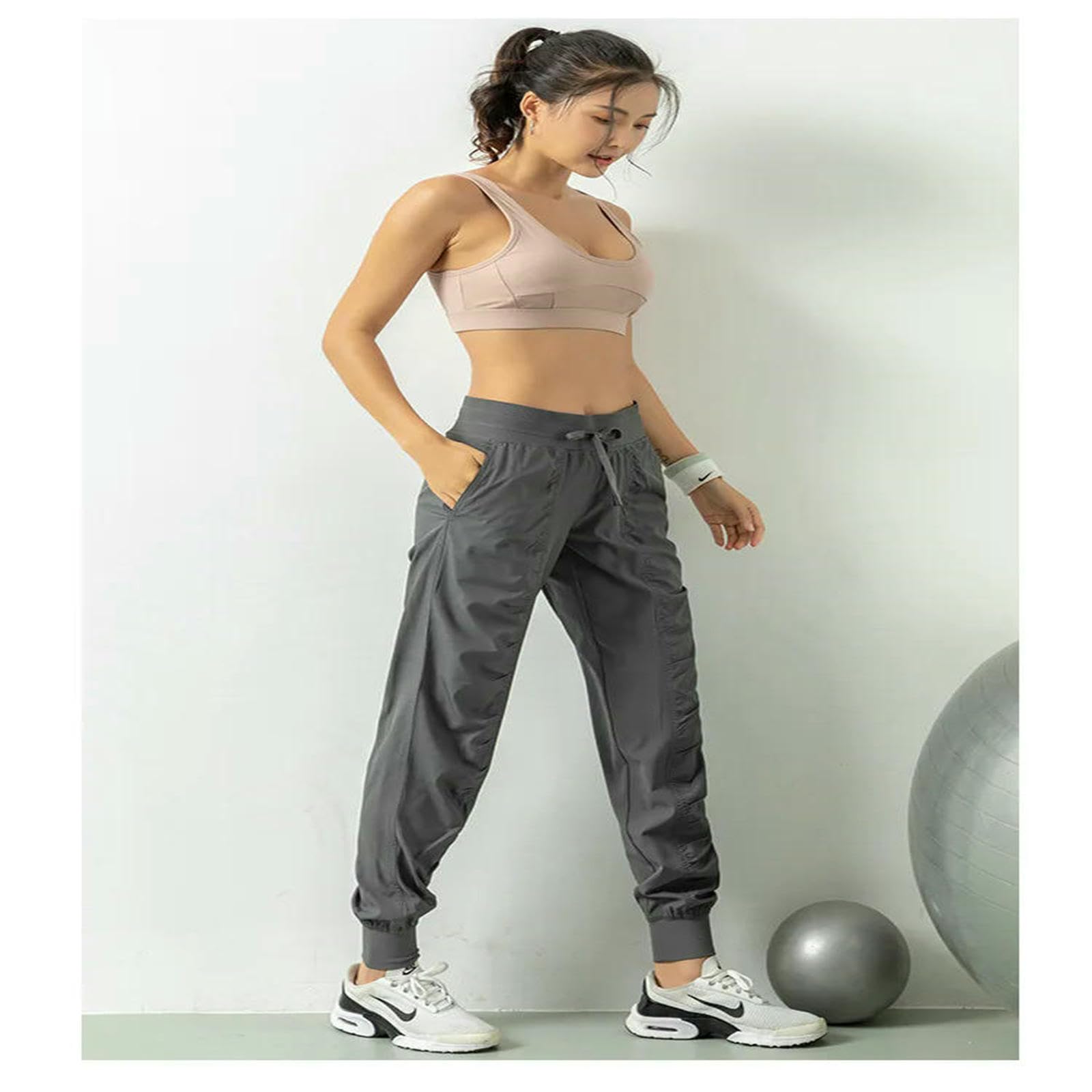 Spodnie damskie plisowane spodnie legginsy fitness spodnie sportowe luźne spodnie ze sznurkiem do biegania na co dzień