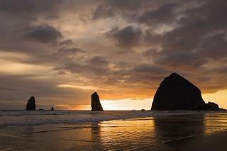 Posterazzi Silhouette Formations And Haystack Rock At Sunset Cannon Beach Oregon United States of America Poster Print, (18 x 12)