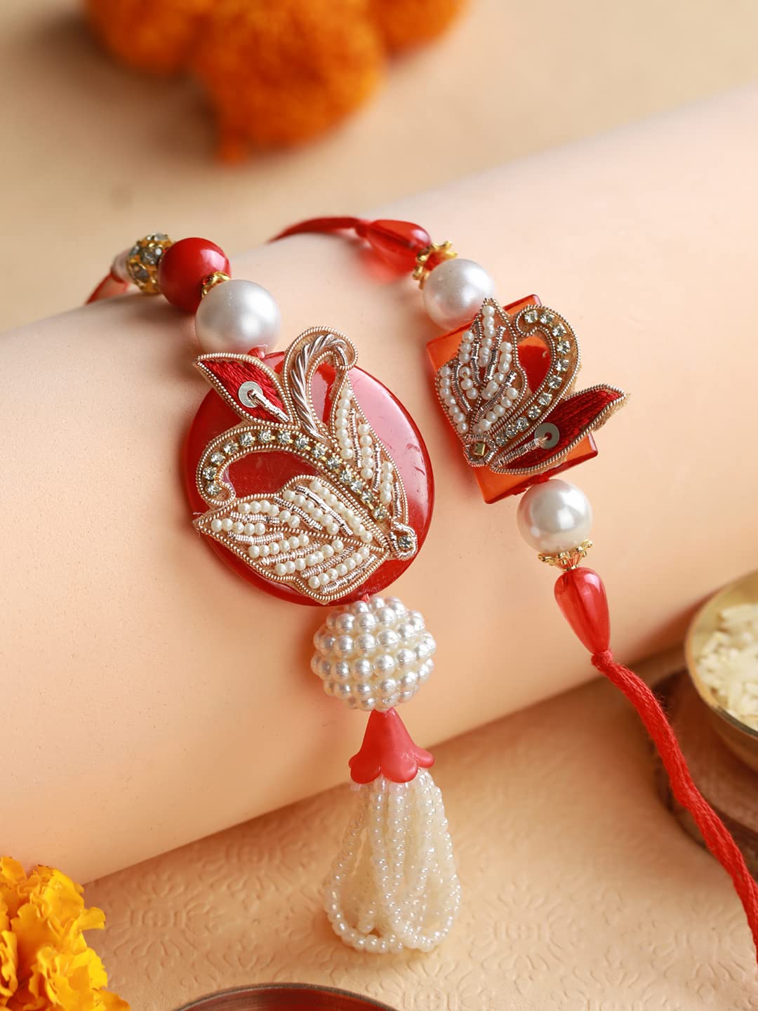 Priyaasi Rakshabandhan Red Beaded Fancy Lamba and Rakhi Set with Roli Chawal, Greeting Card for Bhaiya-Bhabhi, Bhai, Brother, Men - Traditional Stylish Rakhi (Set of 2) - Image 7 thumbnail