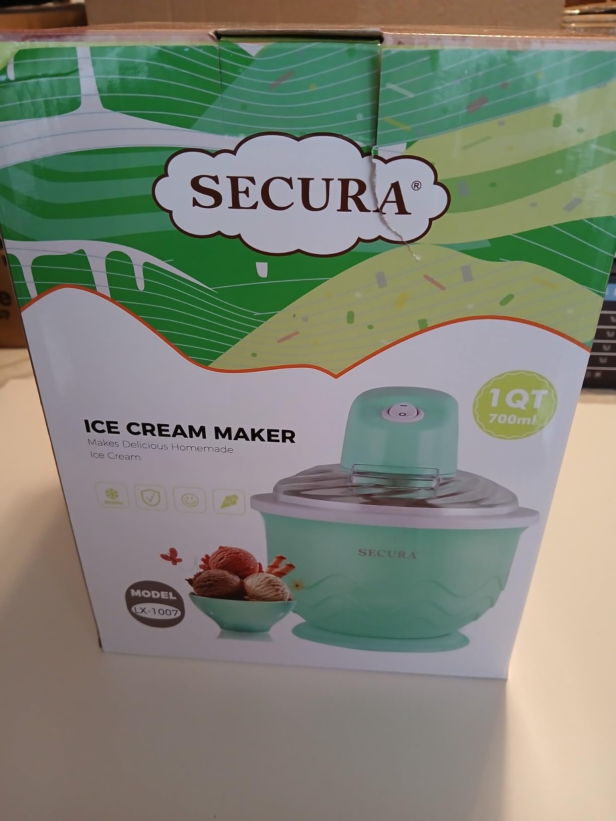 Step 1: Remove frozen freezer bowl and assemble the ice cream maker.