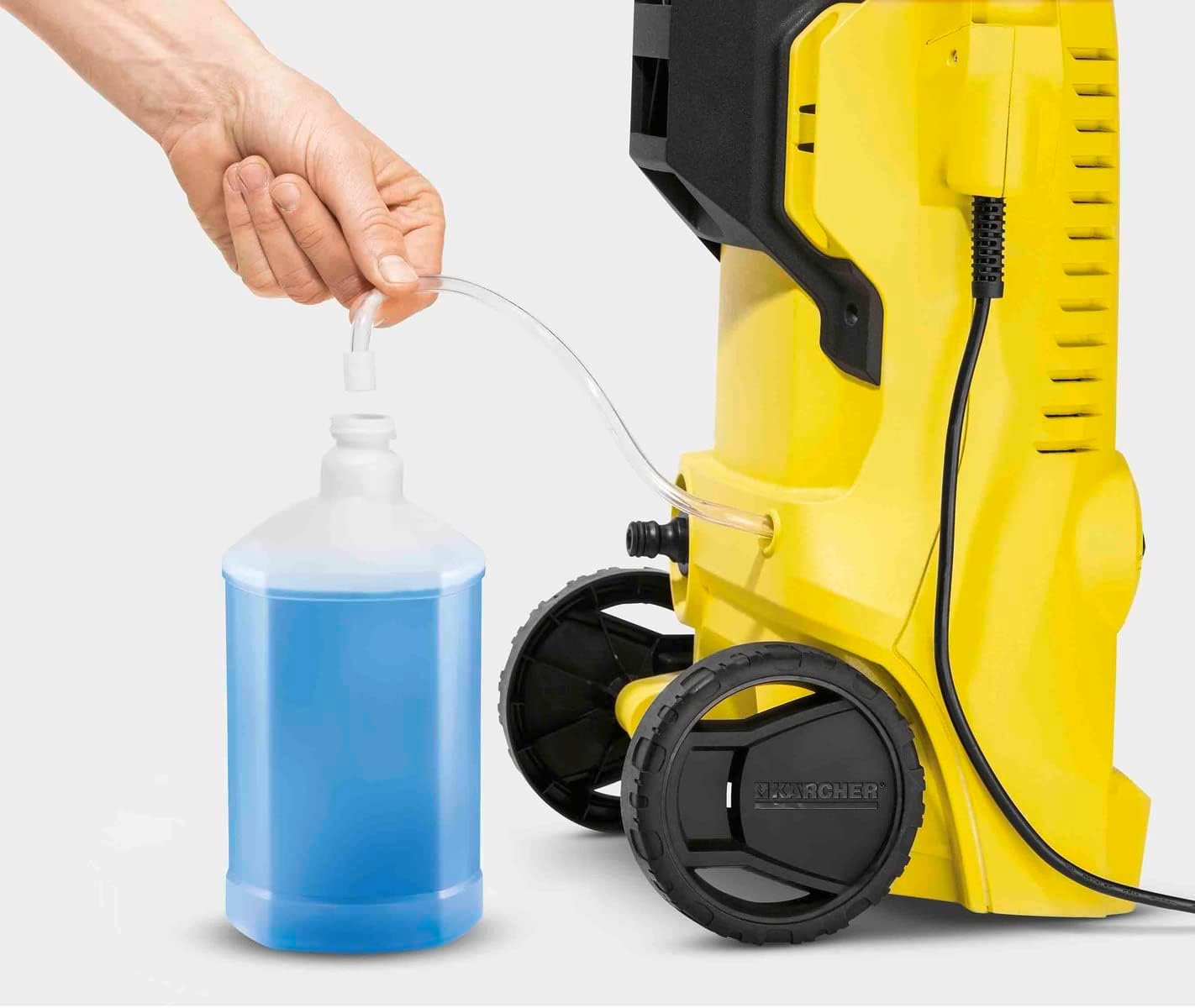 Applying detergent using the pressure washer's suction hose
