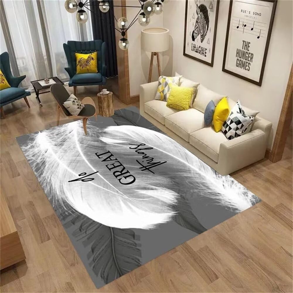 Tapis garcon grand modèle gris à plumes pour créer un coin lecture cosy en chambre d'enfant