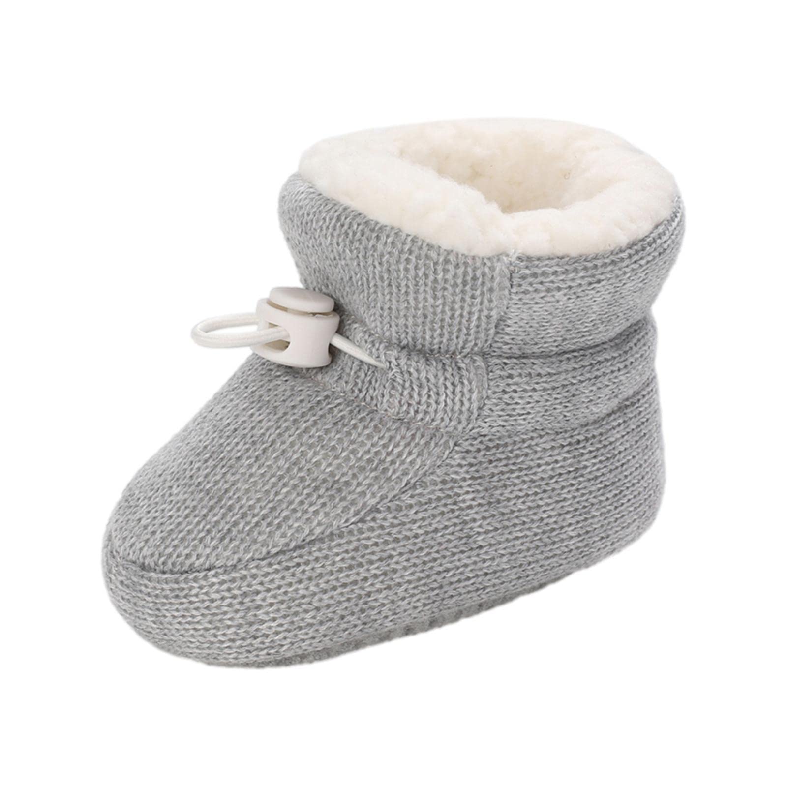 Close-up of the outfit spring baby bootie's soft fleece lining and non-slip sole.