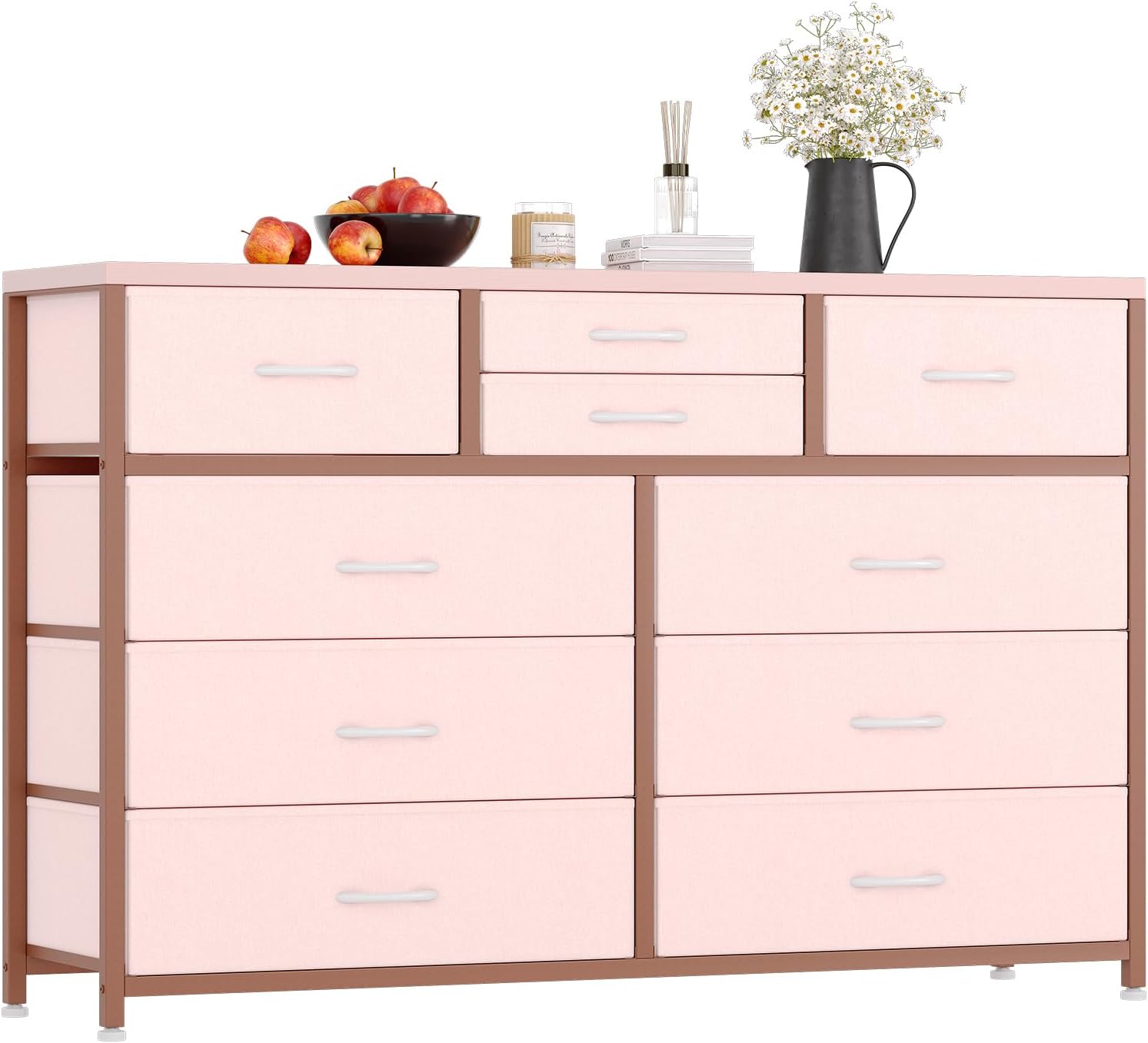 The Jojoka Wide 10-Drawer Fabric Dresser in pink, with all drawers closed, showcasing its full appearance.