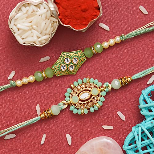Image of eCraftIndia Unisex Adult Set Of 2 Peacock Feather And Floral Designer Rakhis For Brothers With Roli Chawal