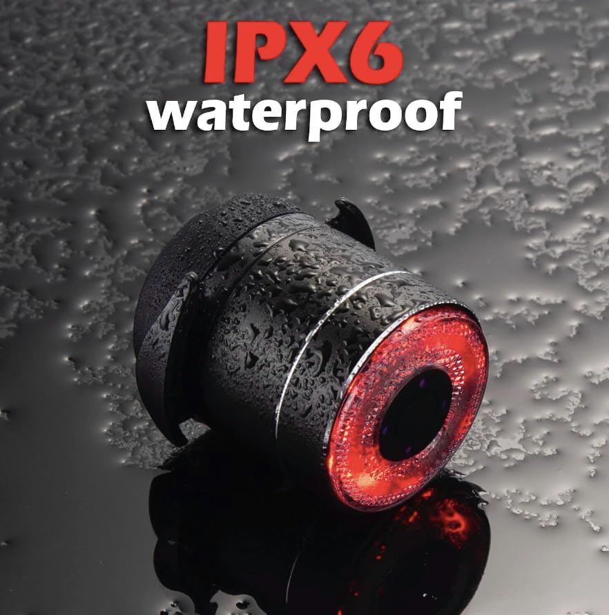 Close-up of the Antusi Q3 Tail Light with water droplets, emphasizing its IPX6 waterproof rating.