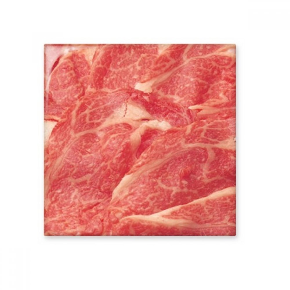 Cadeau artisanat pierre agneau rolls viande crue en carrelage céramique brillant
