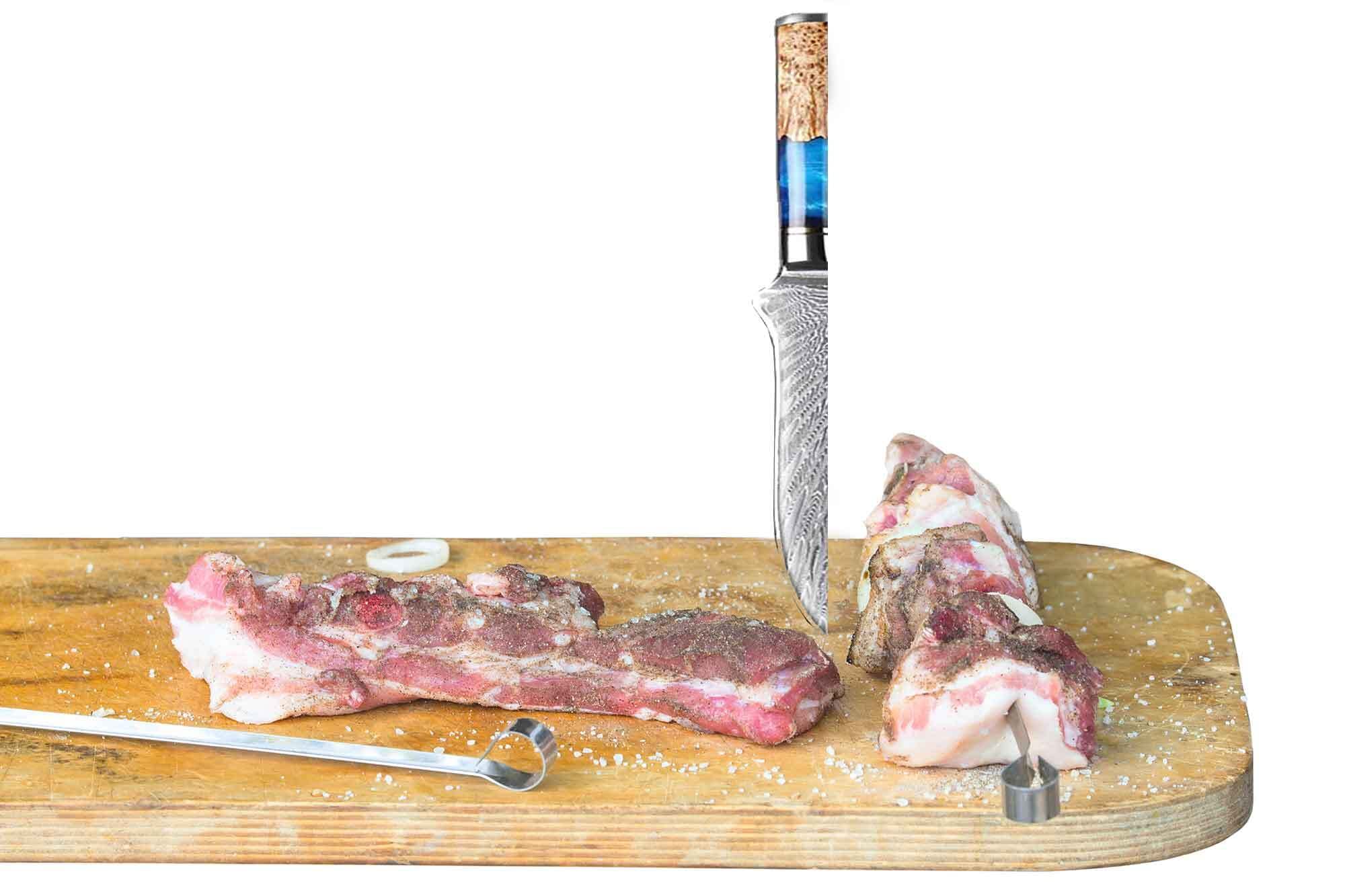 Muxel Das Ausbeinmesser mit extrem scharfer Klinge. Ergonomisch geformter Griff mit unikatem Farbmuster am Griff
