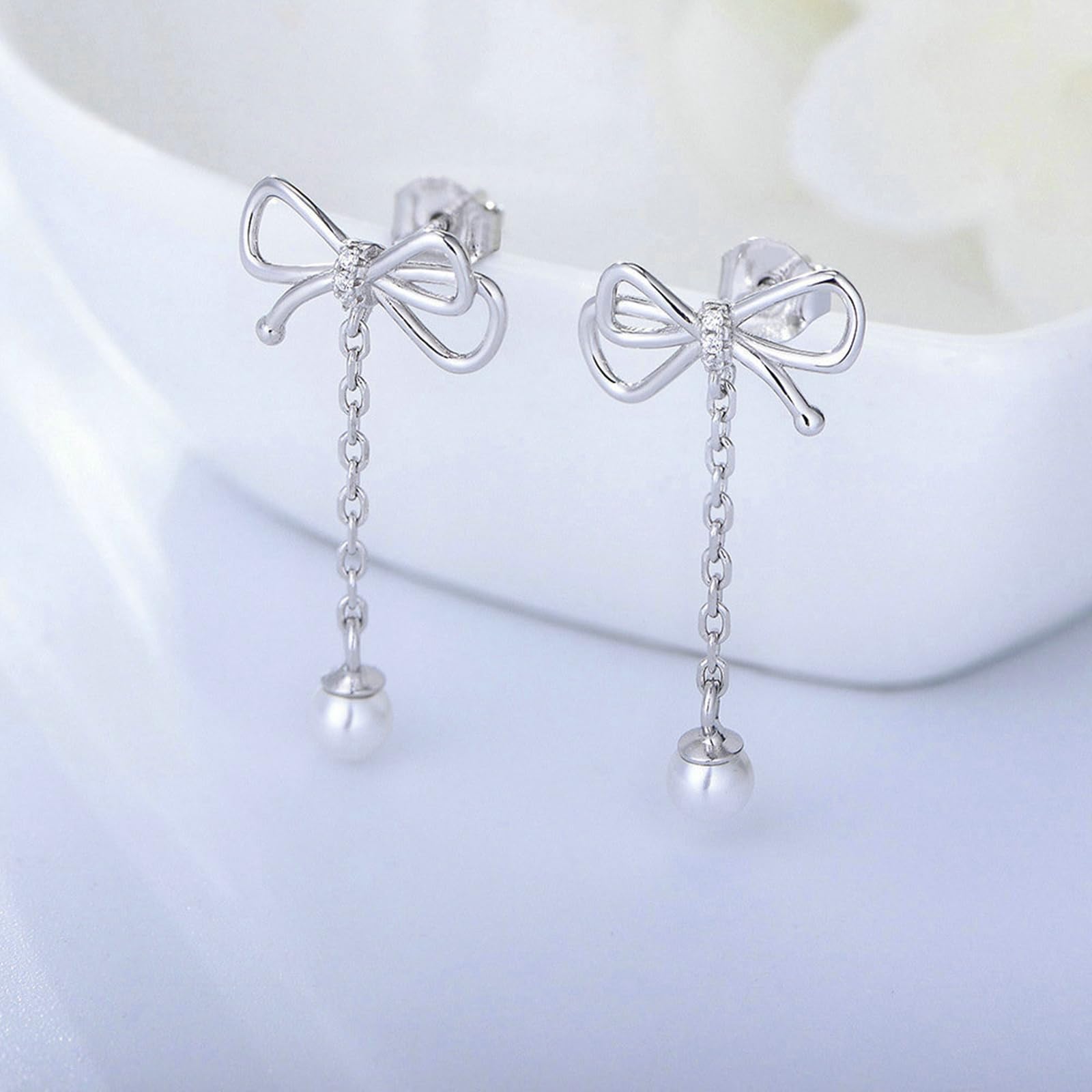 Orecchini pendenti da donna con perle in oro 9/14/18 kt, con fiocco e diamanti