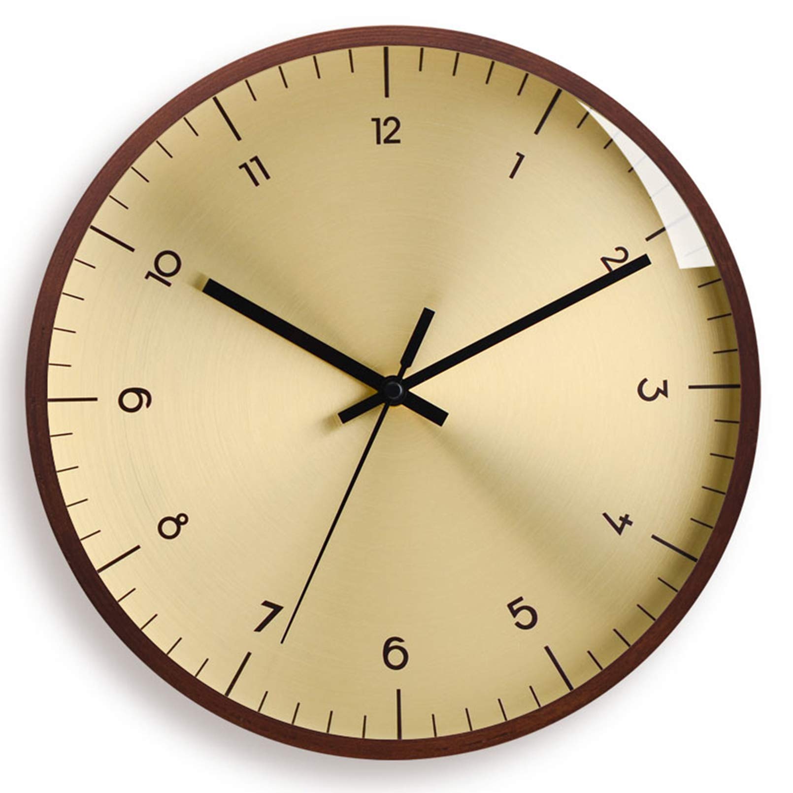 Horloge murale en or rose pour sublimer un mur vide et personnaliser votre salon