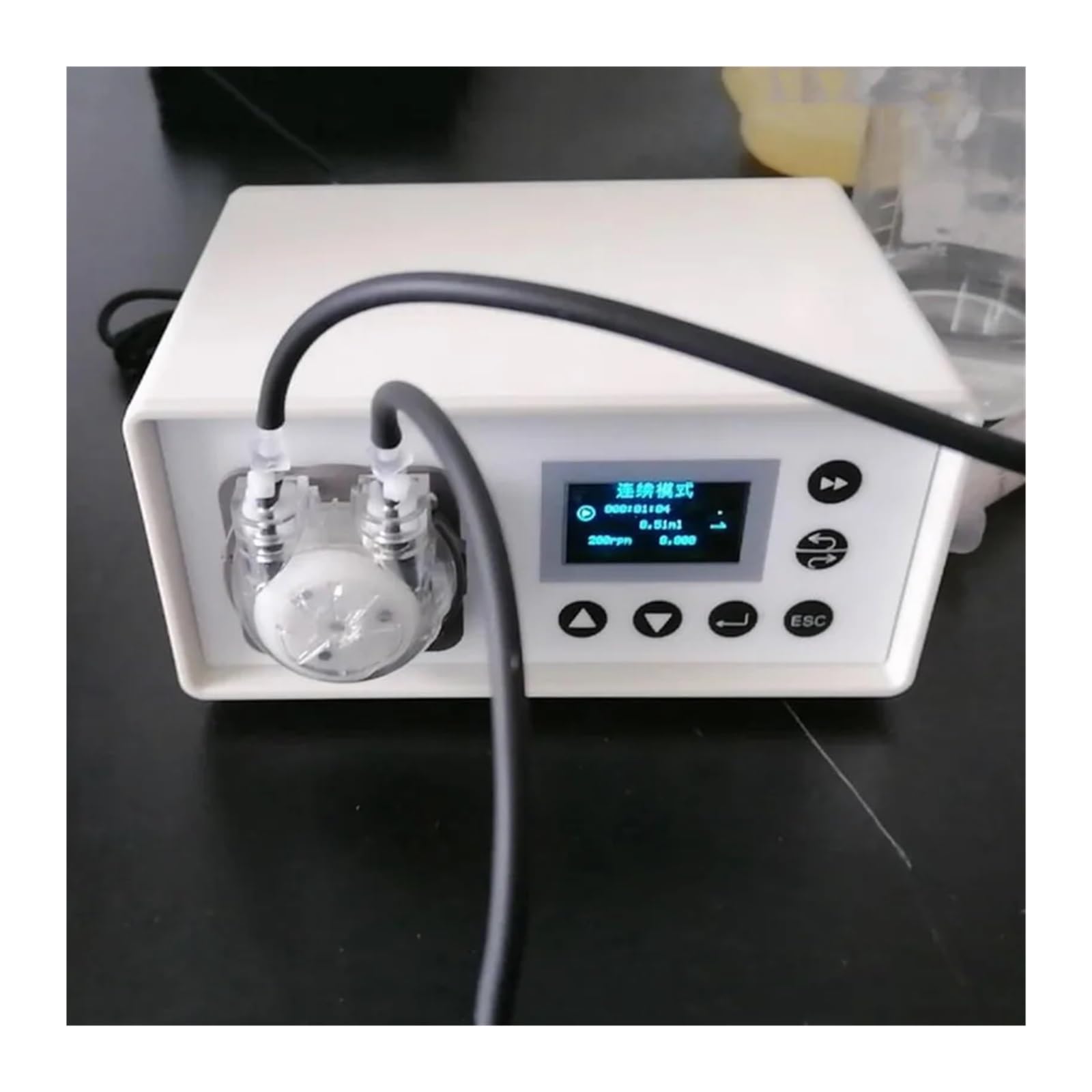Bomba peristáltica de precisión for uso en laboratorio, con caudal ajustable de 0,04 a 16 ml/min y pedal.