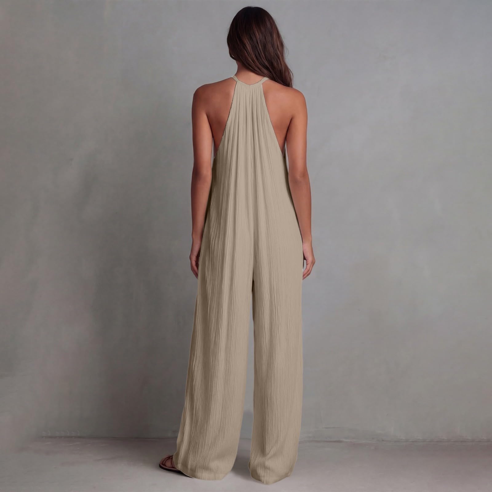 Tuta da donna elegante e festosa, con allacciatura al collo, schiena scoperta | Tuta intera a gamba larga con tasche, morbida e confortevole, casual, lunga, per le vacanze