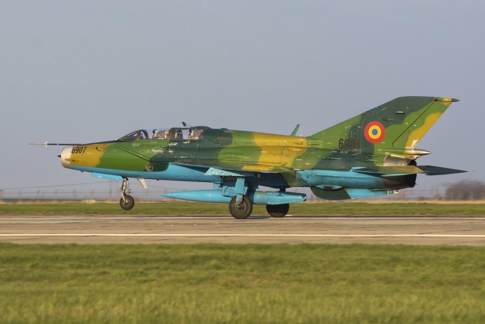 A Romanian Air Force MiG-21UM Lancer-B landing at an airbase in Romania Poster Print by Daniele FaccioliStocktrek Images (17 x 11)