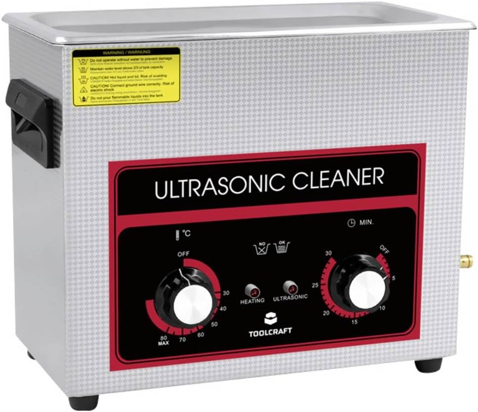Angled view of the TOOLCRAFT USC-650 Ultrasonic Cleaner showing the side handle and drain tap