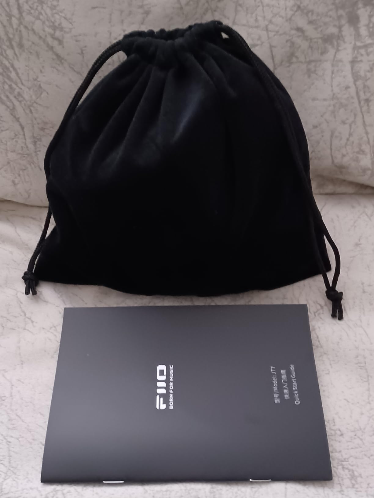 FiiO JT7 foldable planar magnetic headphones showing compact design and adjustable headband