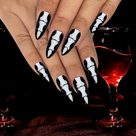 Yivaiks Halloween Press on Nails Medium Stiletto Acrylic Press Ons Skeleton Vampire Nails Artificial Black False Fake Nails With Glue on Halloween Nail Charms Kit 24pcs