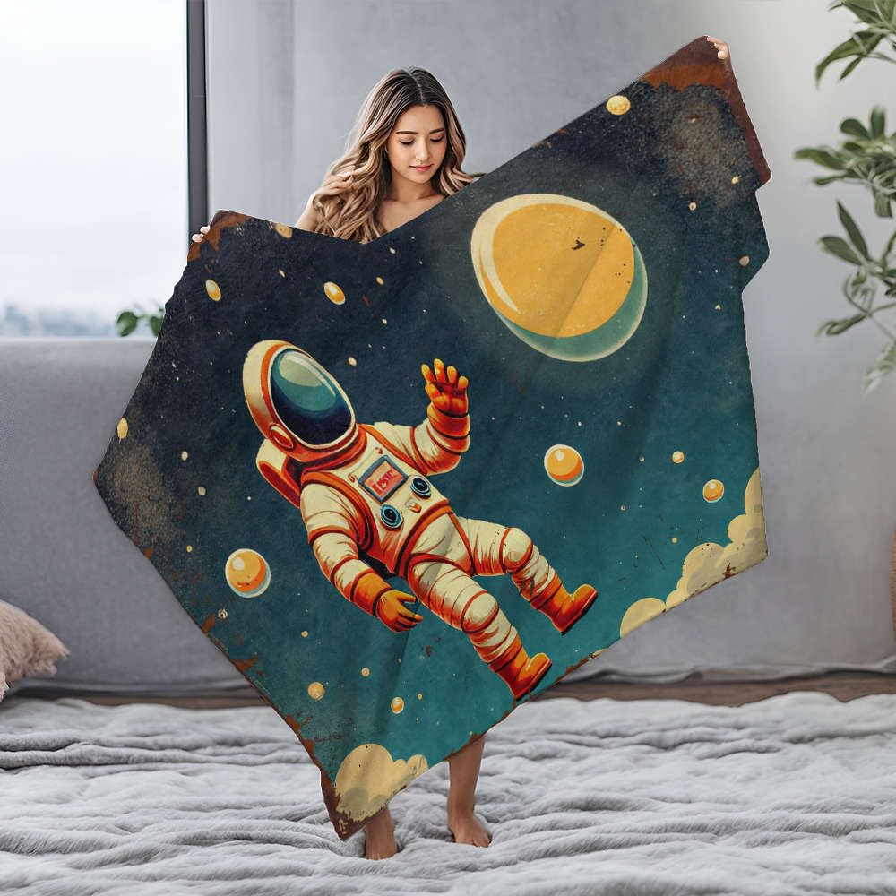 Couverture flanelle astronaute 150x200 pour des nuits étoilées dans le salon